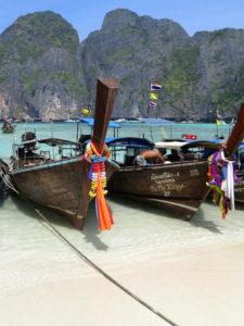 Boats on the beach at Phuket Thailand