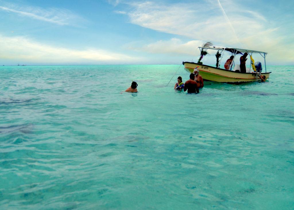 people snorkeling near Bora Bora